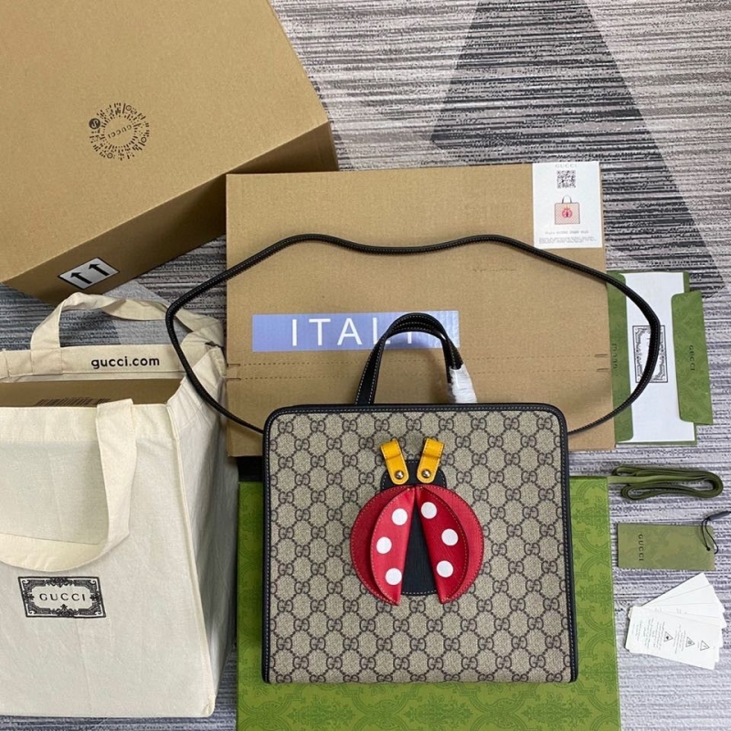 G*u*i shopping bags